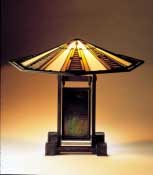 Designed by Frank Lloyd Wright (American, 1867-1959)
Made by Linden Glass Co., Chicago, Illinois
Table Lamp, from the Susan Lawrence Dana House, Springfield, Illinois, 1902-4
Leaded glass, bronze, brass, and zinc
Base:  20-1/2 x 12 x 8-7/8 in. (52 x 30.5 x 22.5 cm); shade diameter: 29 in. (73.7 cm)
LACMA, gift of Max Palevsky
� Frank Lloyd Wright / Artists Rights Society (ARS), NY.  
Photo � 2004 Museum Associates / LACMA

