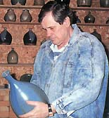 Edouard Bastarache assessing a glaze